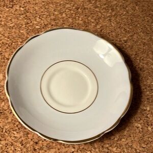 Elegant White and Gold Saucer